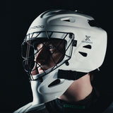 Goalkeeper in the Oxdog XGuard mask at an angle, black cage