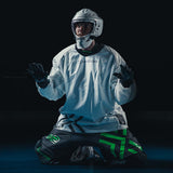 Goalkeeper kneeling in the white Oxdog X2 Plus jersey