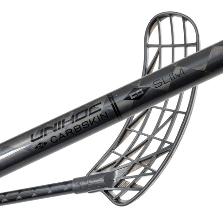 Close-up of the black Unihoc Carbskin 26 Slim Round blade and the shaft markings
